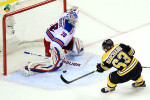 Henrik Lundqvist and Brad Marchand